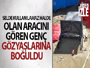 Selde kullanılamaz halde olan aracını gören genç gözyaşlarına boğuldu