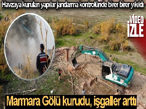 Kuruyan Marmara Gölü havzasına yapılan kaçak yapılar jandarma kontrolünde birer birer yıkılıyor