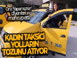 Kadın taksici, yolların tozunu atıyor