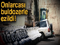 Filipinler'de kaçak onlarca lüks araç buldozerle ezildi