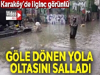 Karaköy'de ilginç görüntü...Göle dönen yola oltasını salladı