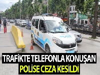 Trafikte telefonla konuşurken emniyet müdürüne yakalanan polise ceza kesildi