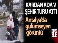 Antalya'da motosikletin arkasındaki kardan adam ile şehir turu attı