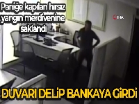 Duvarı delip bankaya girdi, alarm çalınca yakalandı