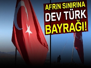 Köylüler Afrin sınırına dev Türk bayrağı astı