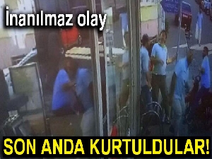 Çatıdan düşen antenden son anda kurtuldular