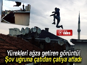 Çılgın gençler taklalarla çatıdan çatıya atladı