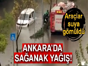 Su basan yolda araçta mahsur kalan vatandaşları itfaiye kurtardı