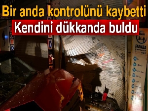 Bursa'da kontrolünü kaybeden otomobil dükkana daldı