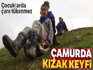 Çamurda kızak keyfi