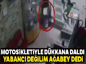 Motosikletiyle dükkana daldı, 'Yabancı değilim ağabey' dedi