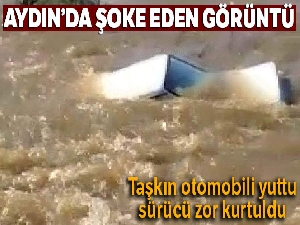Taşkın sonucu kapanan yoldan geçmeye çalışan sürücü ölümle burun buruna geldi