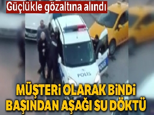 Müşteri olarak bindi, taksicinin başından aşağı su döktü