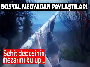 Şehit dedesinin mezarını buldu arkadaşlarıyla mezara bayrak dikti