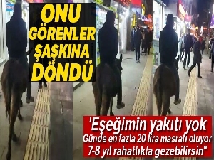 En işlek caddede eşeğiyle gezince görenler şaşkına döndü