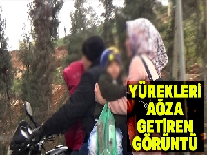Dört kişilik ailenin tehlikeli motosiklet yolculuğu