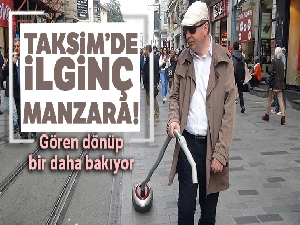 Elektrikli süpürgesini aldı Taksim'e çıktı