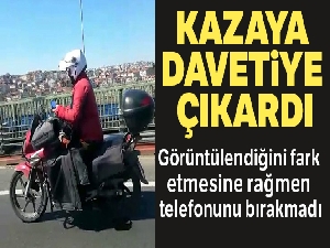 Seyir halinde cep telefonu kullanan motosikletli tehlike saçtı