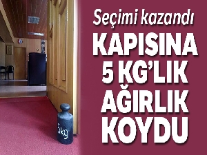 MHP'li belediye başkanı kapısına 5 kg'lık ağırlık koydu