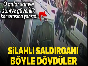 Silahlı saldırgana meydan dayağı kamerada