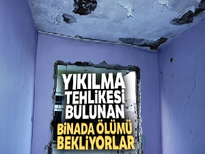 Yıkılma tehlikesi bulunan binada ölümü bekliyorlar
