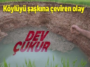 Tarlada oluşan dev obruk çiftçileri korkuttu