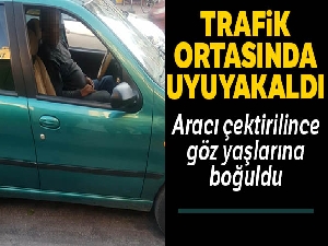 Antalya'da alkollü sürücü akan trafik ortasında uyuyakaldı