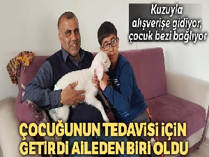 Kuzuyla alışverişe gidiyor, çocuk bezi bağlıyor
