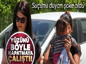 Reçeteli hap satan kadın yüzünü çocuğuyla gizledi
