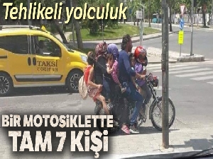 7 kişi bir motosiklette