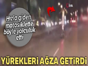 Motosikletli genç kızın ayakta tehlikeli yolculuğu kamerada