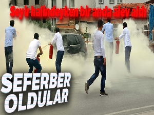 Otomobildeki yangını söndürmek için seferber oldular