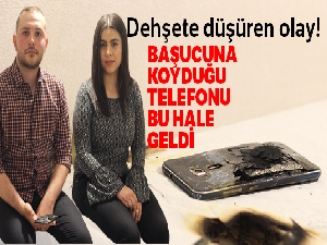 Başucuna koyduğu telefonunun bataryası patlayınca çift dehşeti yaşadı
