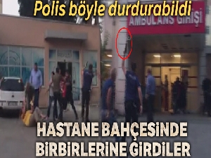 Hastane bahçesinde polisin havaya ateş açarak kavga edenleri ayırdığı olay kamerada