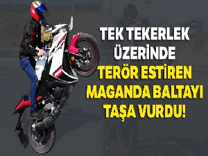 Tek tekerlek üzerinde terör estiren maganda baltayı taşa vurdu