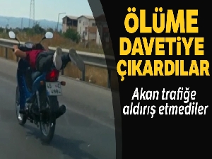 Motosikletli gençlerin tehlikeli oyunu