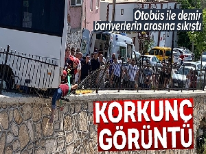 Otobüsün çarptığı adam bariyerlerde sıkıştı