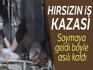 Hırsızın iş kazası, soymaya geldi demir parmaklıkta asılı kaldı