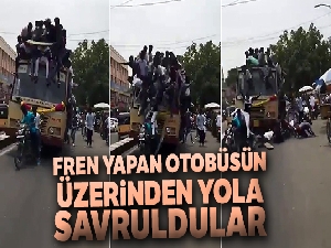 Fren yapan otobüsün üzerinden yola savruldular