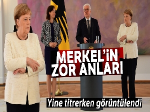 Merkel yine titrerken görüntülendi