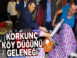 Köy düğününde motorlu testere ile tıraş