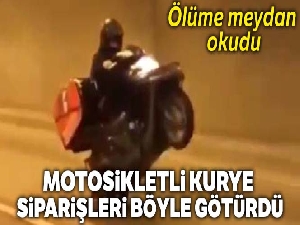 İstanbul'da motosikletli kurye müşterilere siparişleri tek teker üzerinde götürdü