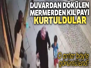 Duvardan dökülen mermerden son anda kurtuldular