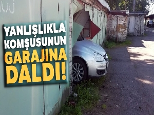 Rus sürücü yanlışlıkla komşusunun garajına daldı