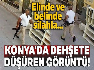 Elinde tüfek, belinde tabanca ile gitmiş