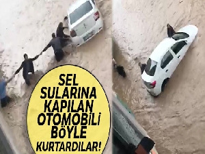 Sel sularına kapılan otomobili yüzdürerek kurtardılar