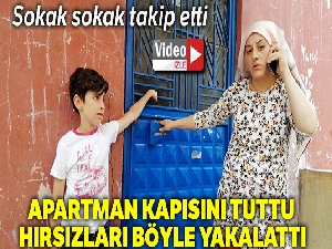 Apartman kapsını sıkıca tuttu, kadın hırsızları böyle yakalattı