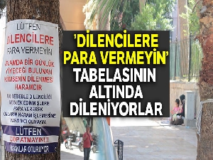 'Dilencilere para vermeyin' tabelasının altında dileniyorlar