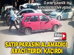 Satıp parasını alamadığı otomobilini iterek kaçırırken güvenlik kamerasına yakalandı
