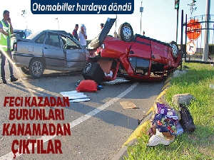 Hurdaya dönen otomobilden burnu kanamadan çıktılar
